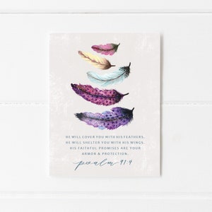 May include: A watercolor painting of colorful feathers with the text "HE WILL COVER YOU WITH HIS FEATHERS. HE WILL SHELTER YOU WITH HIS WINGS. HIS FAITHFUL PROMISES ARE YOUR ARMOR & PROTECTION. psalm 91:4"