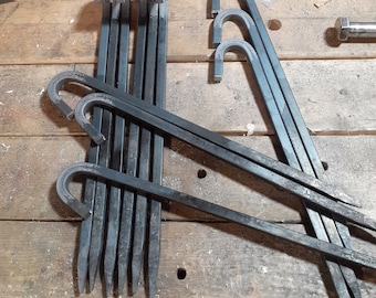 One dozen Blacksmith Forged tent stakes 12.5" long