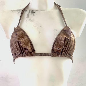 bikini top, swimsuit tuck, gaff tucking, thong tuck transgender woman, trans person, non-binary