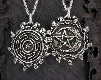Double sided necklace of Hecate's wheel (aka Hecate's maze) and moon pentagram, with ivy wreath and antique finish.
