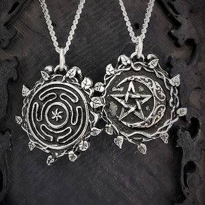 Double sided necklace of Hecate's wheel (aka Hecate's maze) and moon pentagram, with ivy wreath and antique finish.