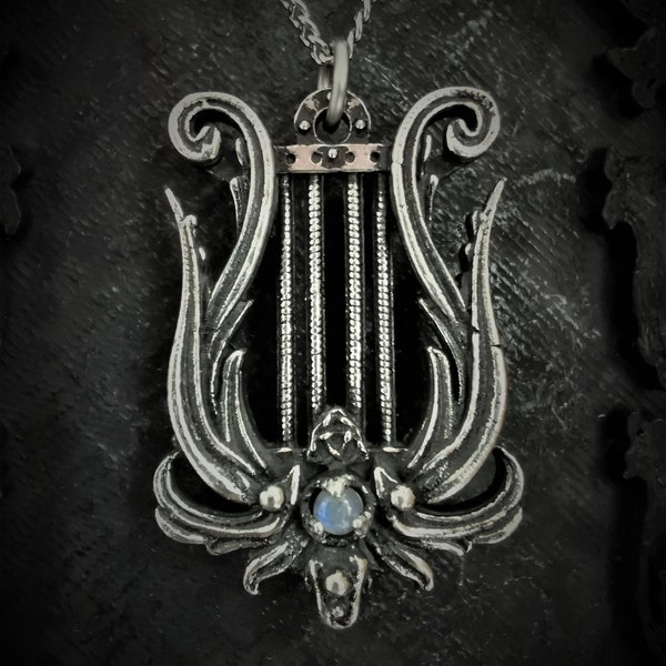 Gothic Lyre necklace orned with a triquetra and a gemstone of your choice