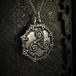 Triskelion Pendant with Gothic Frame and Antique Finish