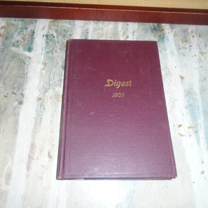 May include: A burgundy hardcover book with the title "Digest" and the year "1939" printed in gold lettering on the front cover.