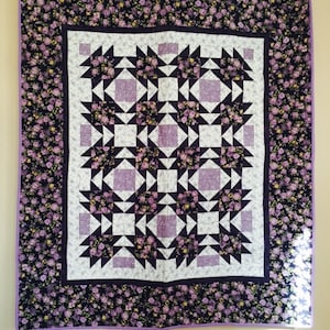 Purple flannel quilt 54 x 62 inches.