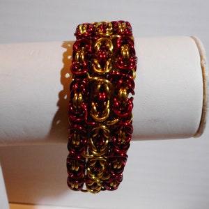 7 inch Gold and Red Anodized Tripple Byzantine Aluminum  Bracelet