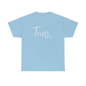May include: Light blue t-shirt with white text that reads "Truth John 14:6".