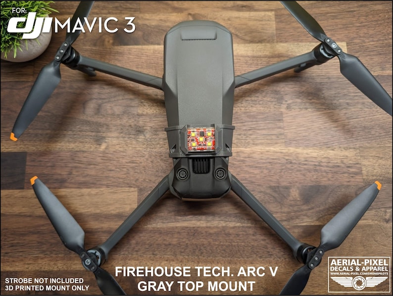 K&ouml;nnte beinhalten: Ein grauer 3D-gedruckter Halter f&uuml;r eine DJI Mavic 3 Drohne. Der Halter ist f&uuml;r einen Blitz ausgelegt, der jedoch nicht im Lieferumfang enthalten ist. Der Halter ist mit "Firehouse Tech. Arc V Gray Top Mount" beschriftet.
