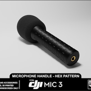 May include: Black microphone handle with a hexagonal pattern grip and a black foam windscreen. The handle is designed for the DJI Mic 3. The text on the image reads "Microphone Handle - Hex Pattern".