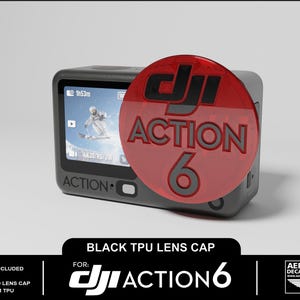 May include: A black action camera with a red lens cap. The lens cap features the text "DJI ACTION 6". The camera screen shows a skier on a snowy mountain. The bottom of the image has the text "BLACK TPU LENS CAP FOR: DJI ACTION 6".