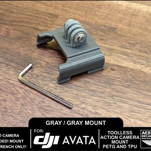 May include: Gray 3D printed action camera mount for DJI Avata drone. The mount is tool-less and made of PETG and TPU.  The mount is shown with a hex wrench.