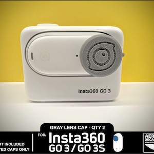 May include: Two gray 3D printed lens caps for the Insta360 GO 3 and GO 3S action cameras. The caps are designed to protect the camera lens from scratches and dirt.