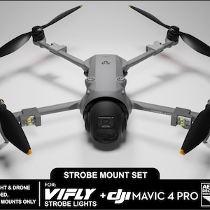 Op de afbeelding: Een grijze drone met vier zwarte propellers en oranje uiteinden. De drone heeft een zwarte camera en is gelabeld met "DJI MAVIC 4 PRO". De afbeelding bevat de tekst "STROBE MOUNT SET" en "VIFLY + DJI MAVIC 4 PRO STROBE LIGHTS".