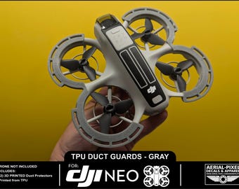 May include: Gray TPU duct guards for the DJI Mini 3 Pro drone. The guards are 3D printed and protect the drone's propellers.