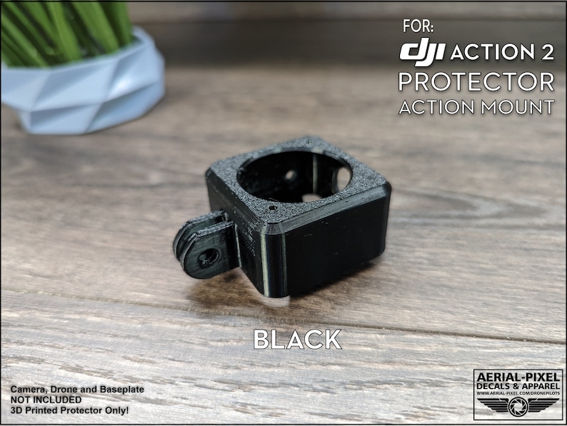 May include: Black 3D printed protector for a DJI Action 2 camera. The protector has a mount for attaching to a tripod or other accessories. "FOR: DJI ACTION 2 PROTECTOR ACTION MOUNT" is printed on the image.