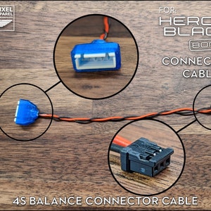 May include: A 4S balance connector cable for the GoPro Hero 10 Black camera. The cable has a blue connector on one end and a black connector on the other end. The cable is orange and black.