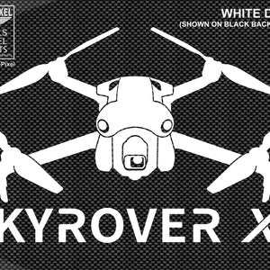 May include: White decal of a drone, labeled SKYROVER X1, on a black background. The decal includes the Aerial-Pixel logo and text indicating it's a white decal. The drone design features four propellers.