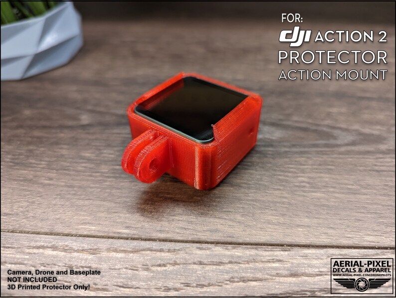 May include: Red 3D printed protector for a DJI Action 2 camera. The protector has a clear screen cover and a mount for attaching to a drone or other equipment.  FOR: DJI ACTION 2 PROTECTOR ACTION MOUNT. Camera, Drone and Baseplate NOT INCLUDED. 3D Printed Protector Only!