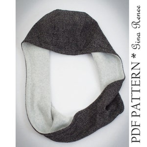Pode incluir: Uma echarpe revers&iacute;vel de gola alta cinza e branca. A echarpe &eacute; feita de um tecido macio e texturizado.  PDF PATTERN * Gina Renee