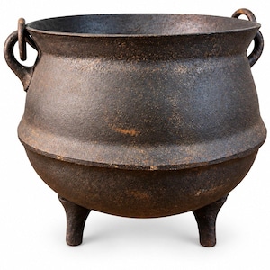 May include: A dark brown, textured cast iron cauldron with a wide, open top, a rounded body, and three short, sturdy legs. The vessel features two small, curved handles attached to the sides near the rim, showcasing a weathered, rustic finish.