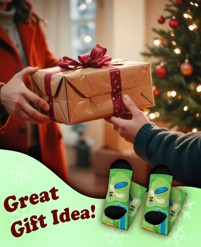 May include: A wrapped gift box with a burgundy ribbon is being passed between two people. The image also features green socks with a disc golf course design and the text "Great Gift Idea!"
