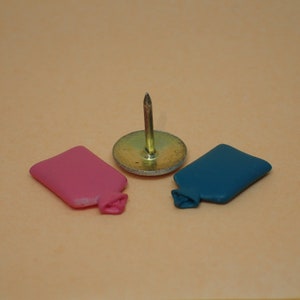 Two &#39;rubber&#39; hot water bottles, 1/24th scale