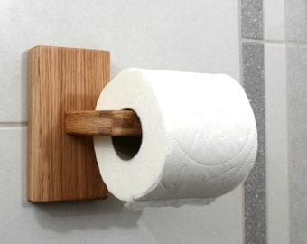 Oak wood toilet roll holder, without oil finish on surface. Wood toilet paper holder.