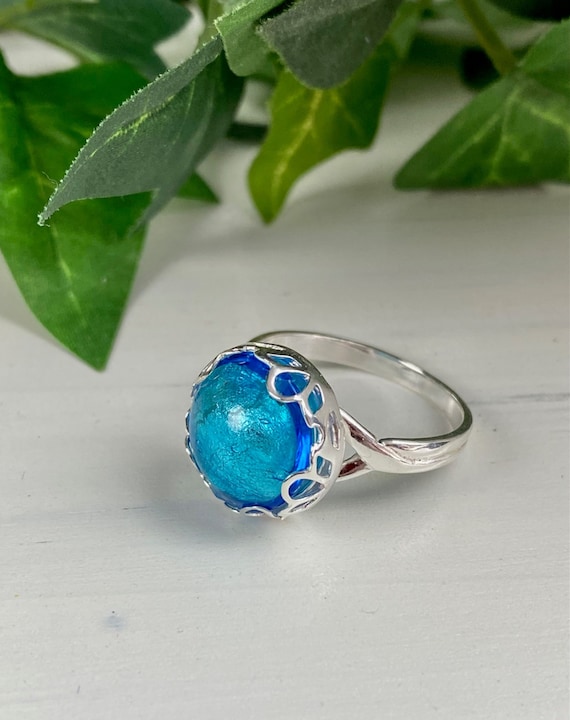 Blue glass ring discount
