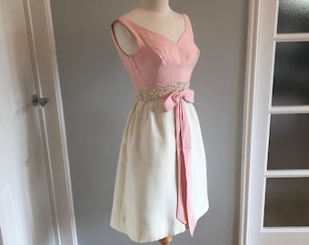 Classic 1950&#39;s vintage figure hugging pink and white wiggle dress with a gorgeous flower pattern embroidery tie waist detail