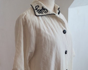A Gorgeous 1950s Cream and black diamond embroidered jacket