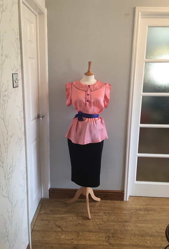A lovely 1960s baby pink silk shirt with electric