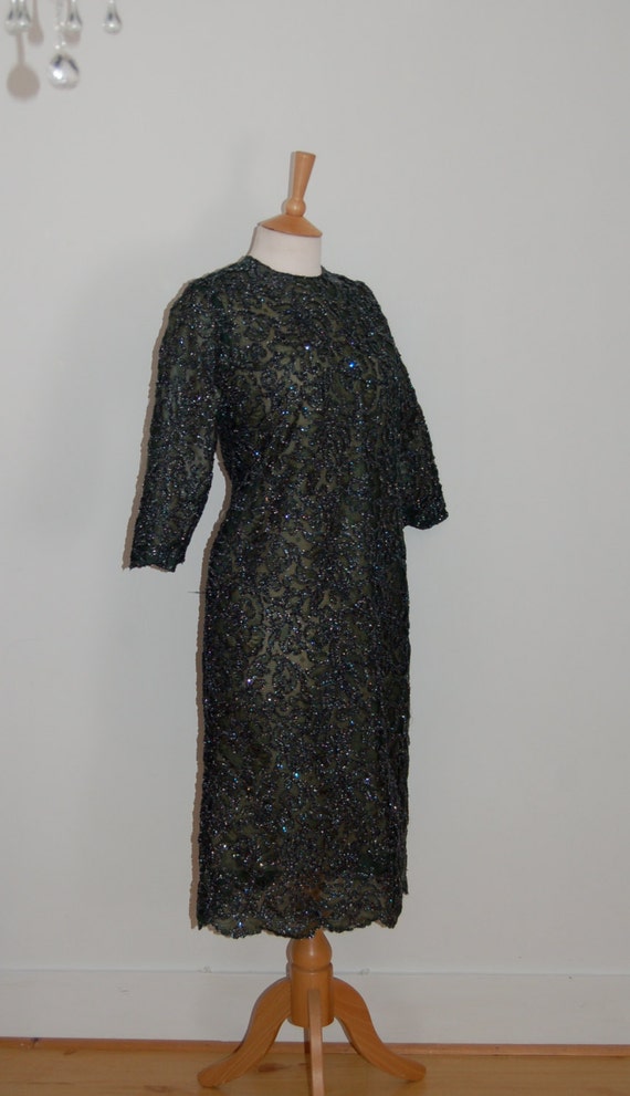 1960s green sparkly shift dress with bracelet length sleeves