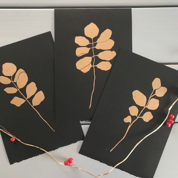 Gold Trio of mimimal , simple pea leaf botanical illustrations. Printed on black paper Kathy Hutton original art