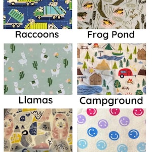 May include: Fabric swatches with various patterns. Designs include raccoons in trucks, frogs in a pond, llamas with cacti, a campground scene, arctic animals, and smiley faces. Each swatch has a different color scheme.