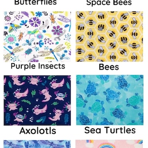 May include: A collection of fabric swatches featuring various patterns. Designs include colorful butterflies, space-themed bees, purple insects, yellow bees, axolotls, sea turtles, dragonflies, and rainbows. Each swatch has the pattern's name displayed.