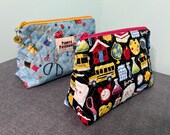 Quilted Zipper Bag with Charm - 10” x 7” with 4” Base
