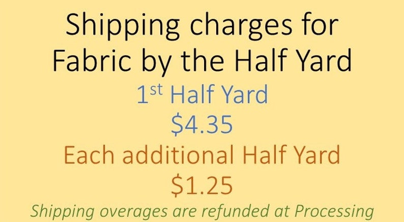 a sign advertising a yard sale for fabric by the half yard