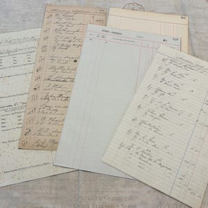 May include: A collection of four vintage paper documents featuring handwritten ledger entries and printed column headers. The papers vary in color from aged cream to off-white, displaying historical financial records with ink script and numerical data.