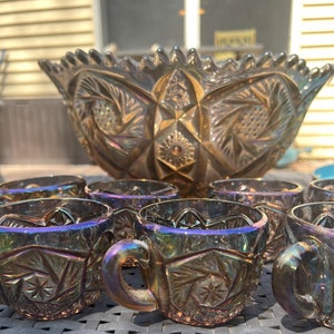 Imperial Glass Punch bowl with 7 cups- smoke or peacock colored carnival glass "Whirling Hobstar" pattern. RARE