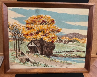 Framed embroidered cottage/ covered bridge trees, printed and embroidered crewel work