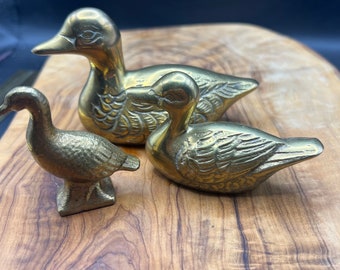 Trio of brass ducks.  Rare and vintage. Made in Korea.