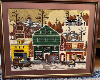 Framed Vintage crewel embroidery Village Main street, florist, meat store, hat store. barn, needlepoint.