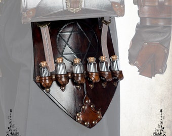 May include: A brown leather belt with a silver buckle and a star-shaped design. The belt has six small glass vials attached to it.