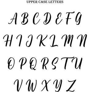 May include: Uppercase letters of the alphabet in a cursive font. The letters are written in black ink on a white background.