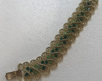 Coro Bracelet - gold tone - two tone green rhinestones - swirl pattern