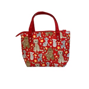 Handbag/tote,Dogie Print, Cotton fabric,Fully Padded,Pockets  inside,Zippered