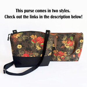 May include: Two purses with a fall-themed pattern of pumpkins, leaves, and flowers on a brown background. One purse has a black base and strap, the other has a brown strap. Text on top says "This purse comes in two styles. Check out the links in the description below!"