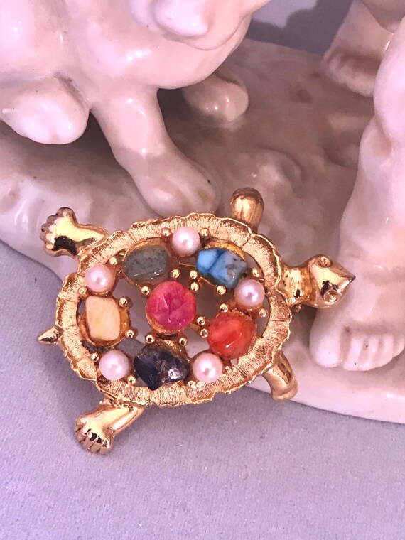 A Dazzling Sarah Cov Goldtone Turtle Pin with a Shell Covered in Rainbow Polished Stones & Faux Pearls