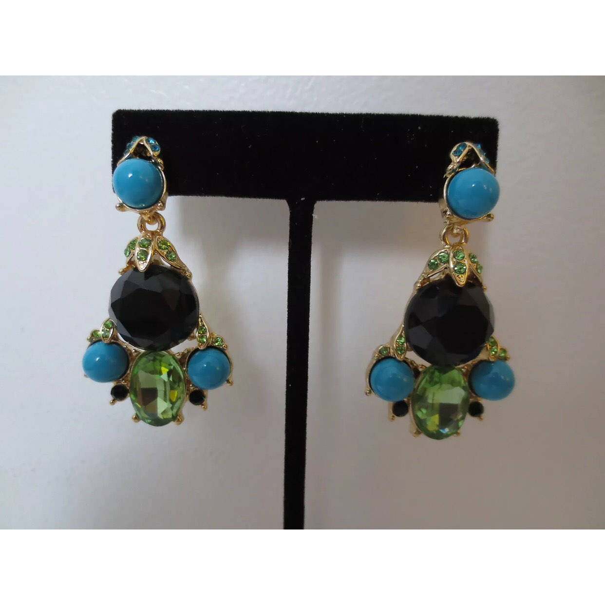 unsigned designer pair of higher end costume jewelry chandelier earrings with faux turquoise and