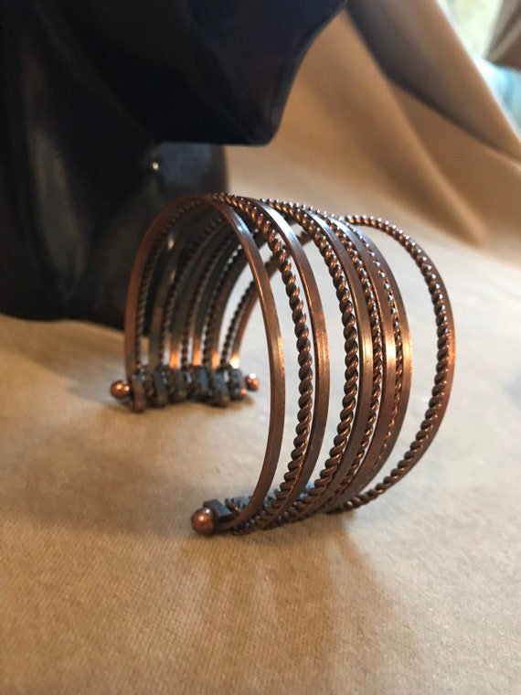 A Nifty Boho Glamour Gringe Bronzy Coopertone Modernist Cuff of Ten Connected Demi Bangles